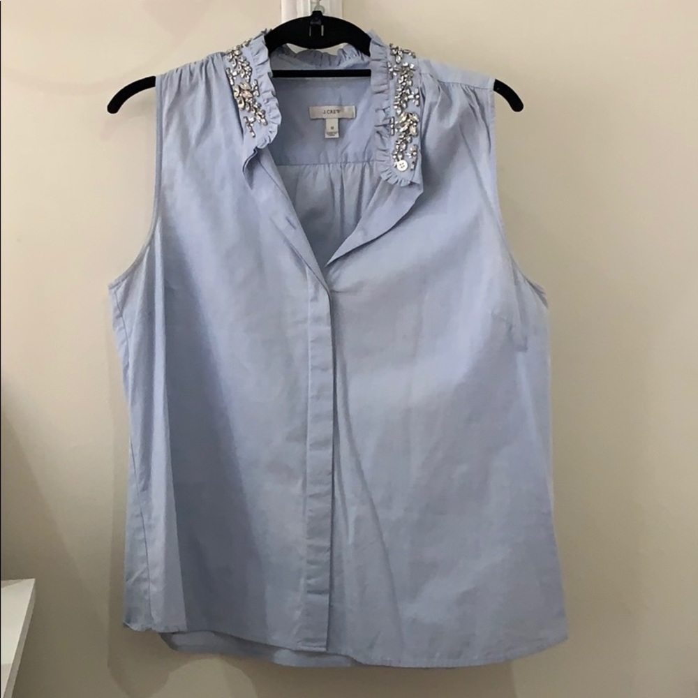 Blue sleeveless button down with gem collar